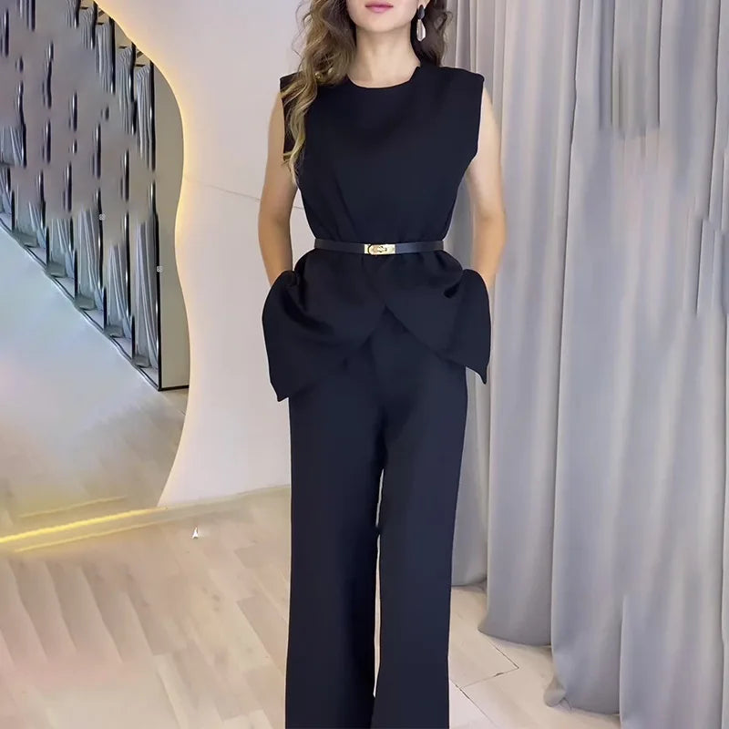 Conjunto feminino elegante com calça de cintura alta e top sem mangas. Perfeito para um visual moderno e sofisticado. Compre agora, Conjunto, Conjunto Alfaiataria Feminino, Conjunto Feminino, Conjunto Feminino Social, Conjunto Feminino Blusa e Short, Conjunto Feminino Calça e Blusa, Loja Aiella