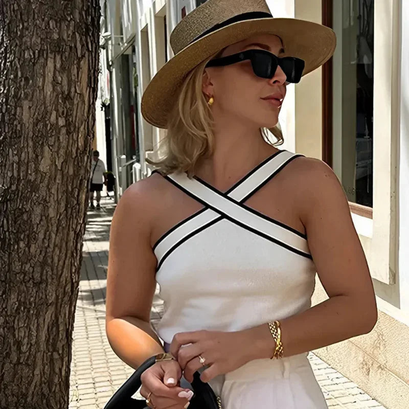 Blusa de tricô, Blusa ombro a ombro, Blusa alça cruzada, Blusa sem costas, Moda feminina, Blusa sofisticada, Blusa de verão, Estilo casual chic, Moda despojada, Blusa sem mangas, Roupas elegantes, Blusa prática, Look moderno, Moda para mulheres modernas, Blusa feminina, Blusa versátil, Blusa elegante, Estilo jovem, Blusa para eventos, Look fashion, Loja Aiella