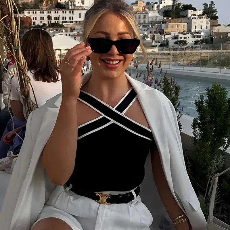 Blusa de tricô, Blusa ombro a ombro, Blusa alça cruzada, Blusa sem costas, Moda feminina, Blusa sofisticada, Blusa de verão, Estilo casual chic, Moda despojada, Blusa sem mangas, Roupas elegantes, Blusa prática, Look moderno, Moda para mulheres modernas, Blusa feminina, Blusa versátil, Blusa elegante, Estilo jovem, Blusa para eventos, Look fashion, Loja Aiella