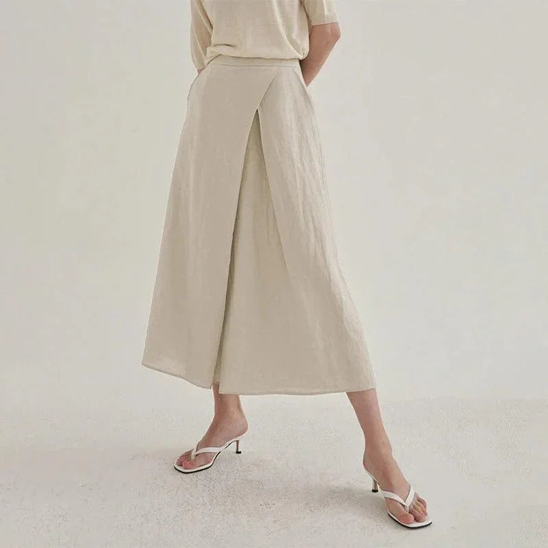Calça de Linho, Calça Transpassada, Calça de Linho, Moda Confortável, Estilo Sofisticado, Look Casual, Roupas de Verão, Calça Feminina Elegante, Conforto e Estilo, Peça Atemporal, Tendência de Moda, Design Moderno, Loja Aiella